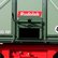 Continuous rear wall with opened discharge slider