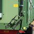 Hydraulic opening side wall unlocking