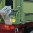 Hydraulically actuacted side panel release